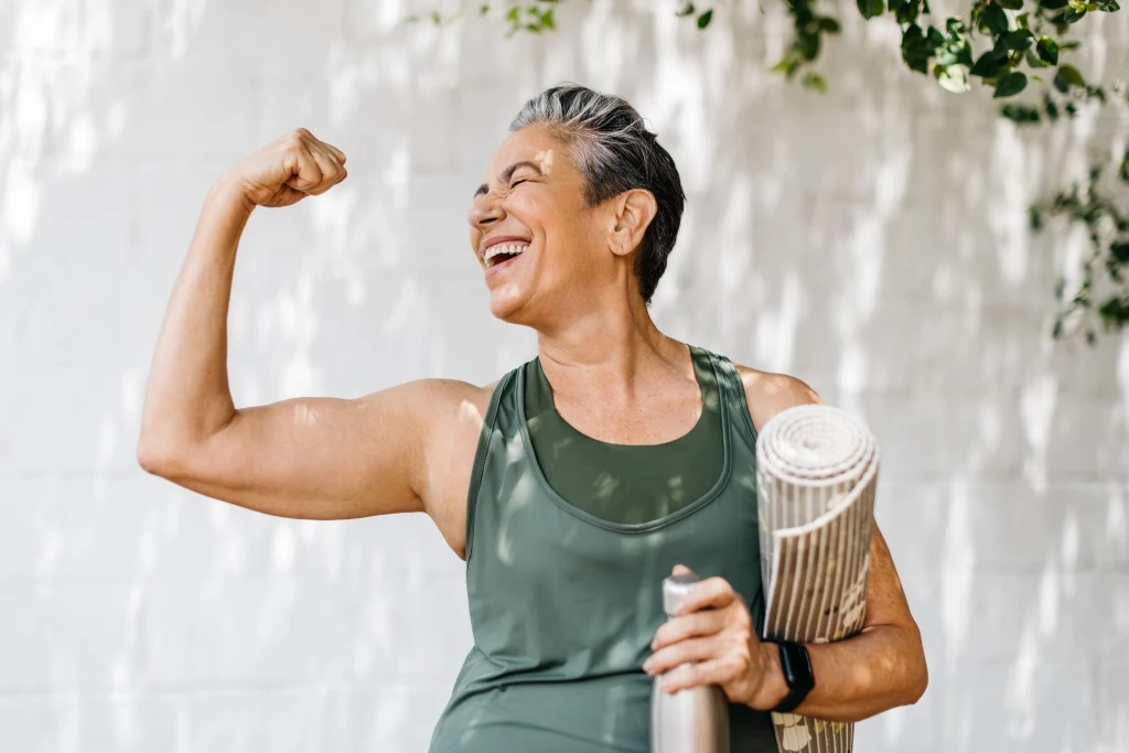 Woman flexing bicep