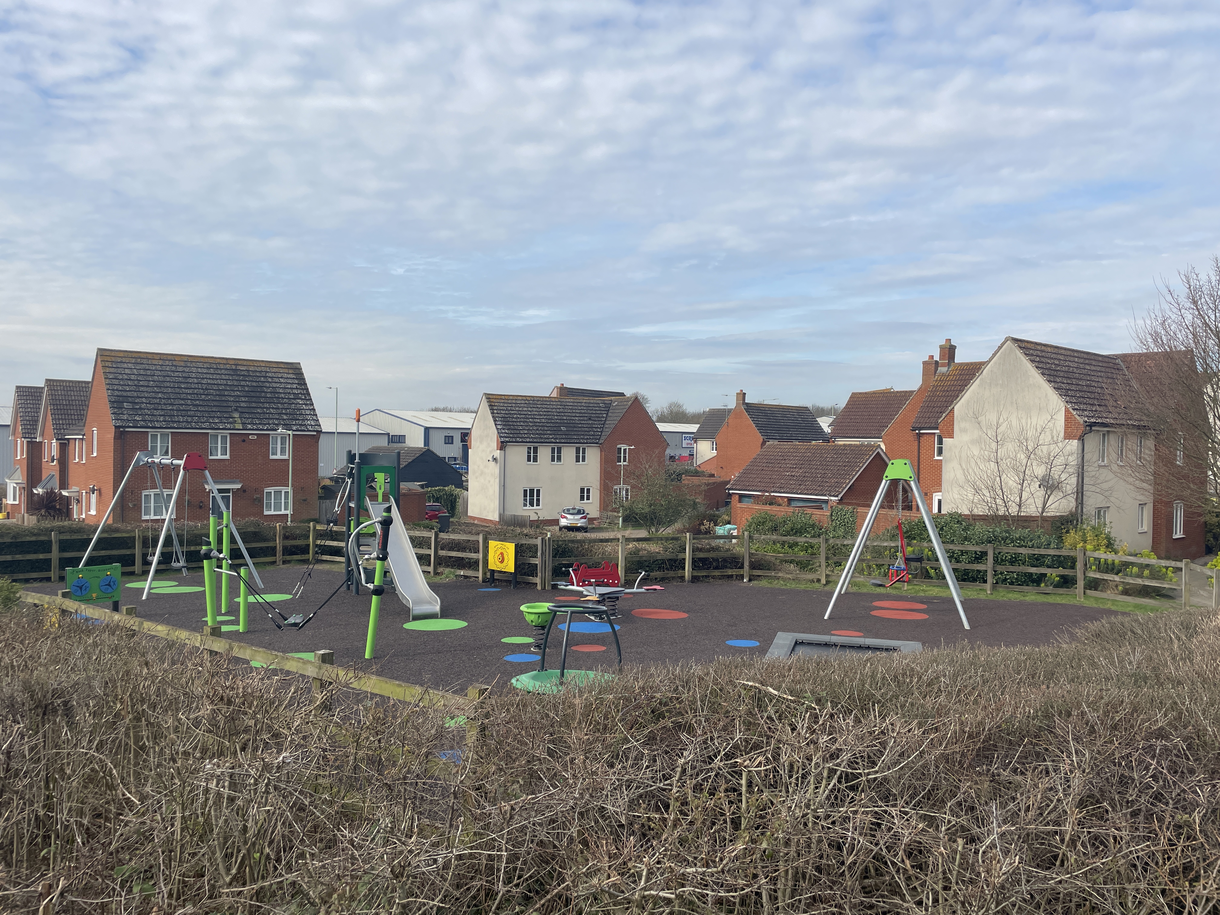 Colourful refurbished playground, maximising play value
