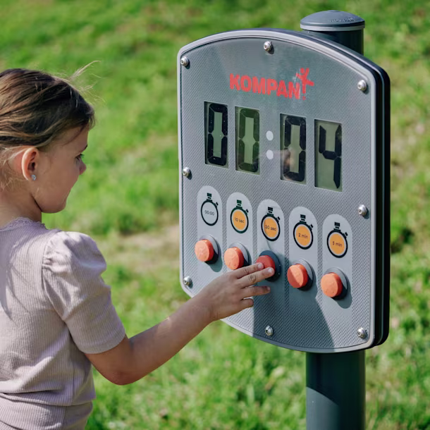 A child playing with an electronic outdoor play timer