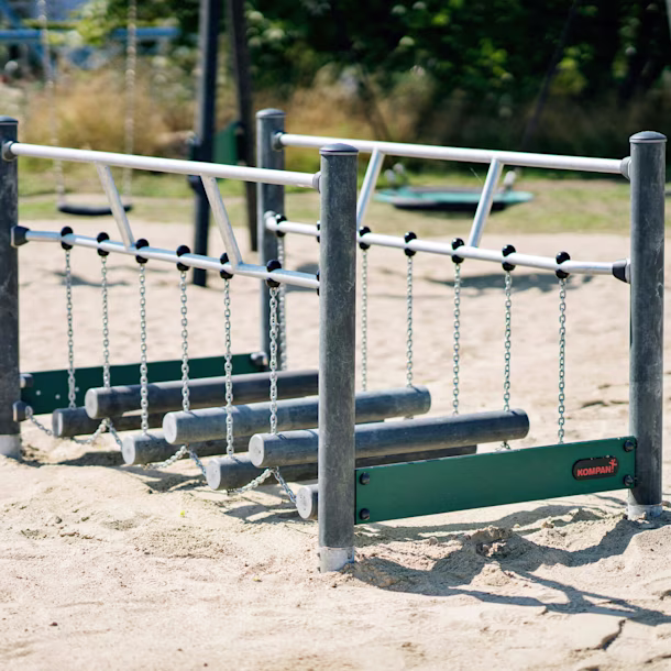 Sway alley balancing playground equipment with posts made of textile waste