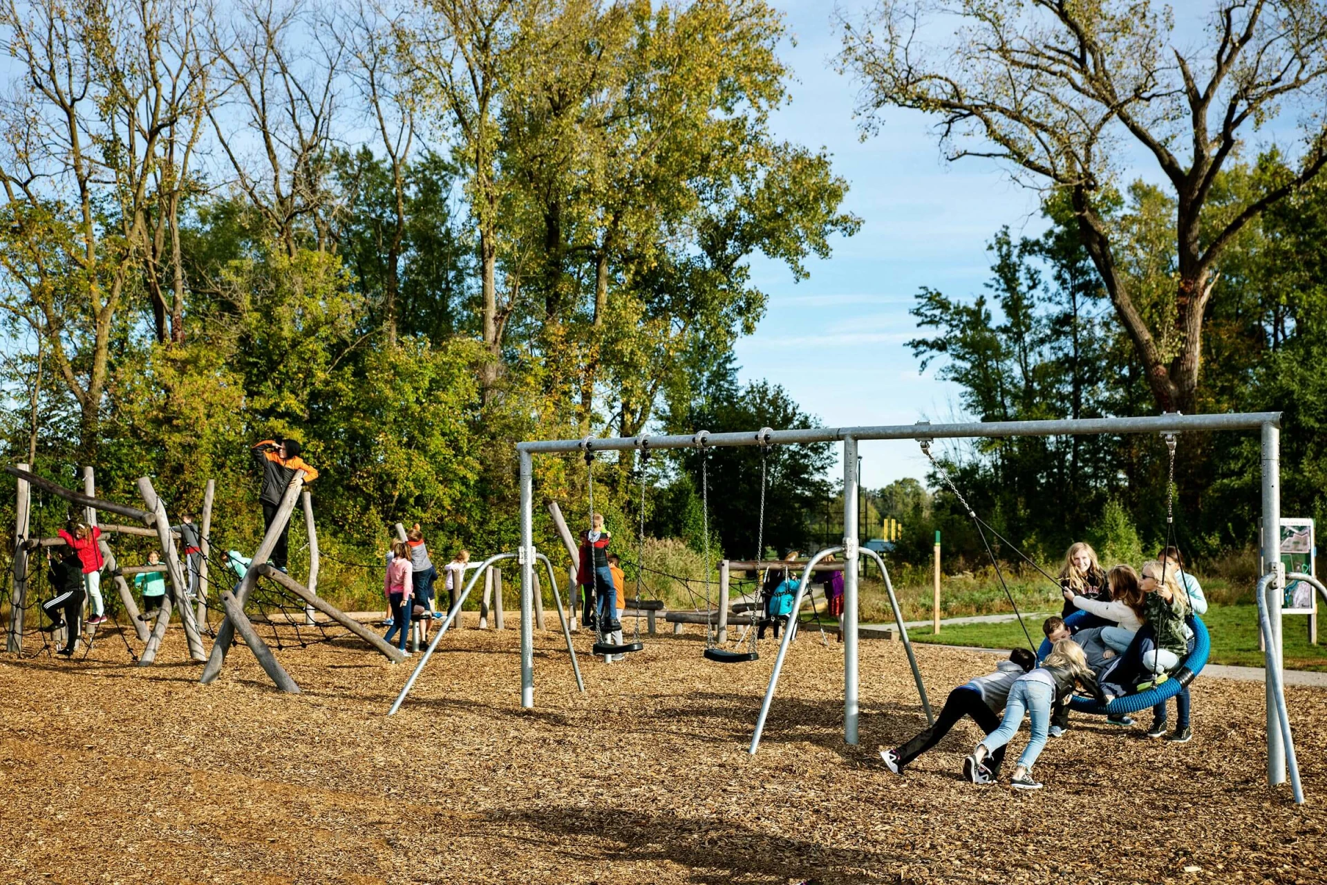 pupils playing and swinging at Riverside Intermediate School 