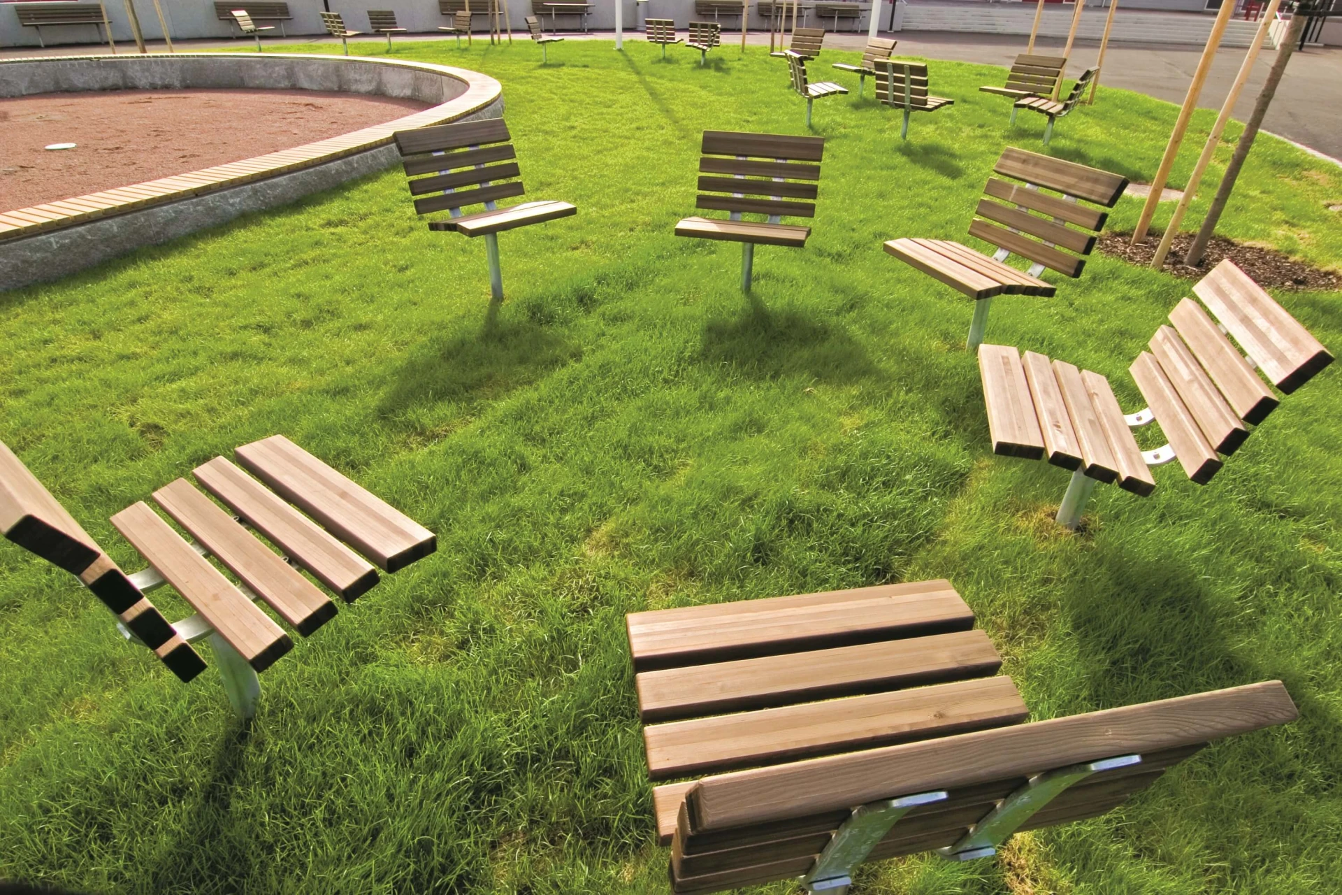 A group of classic wood park seats
