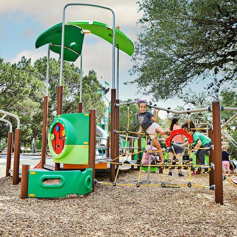children playing on playground system for preschools