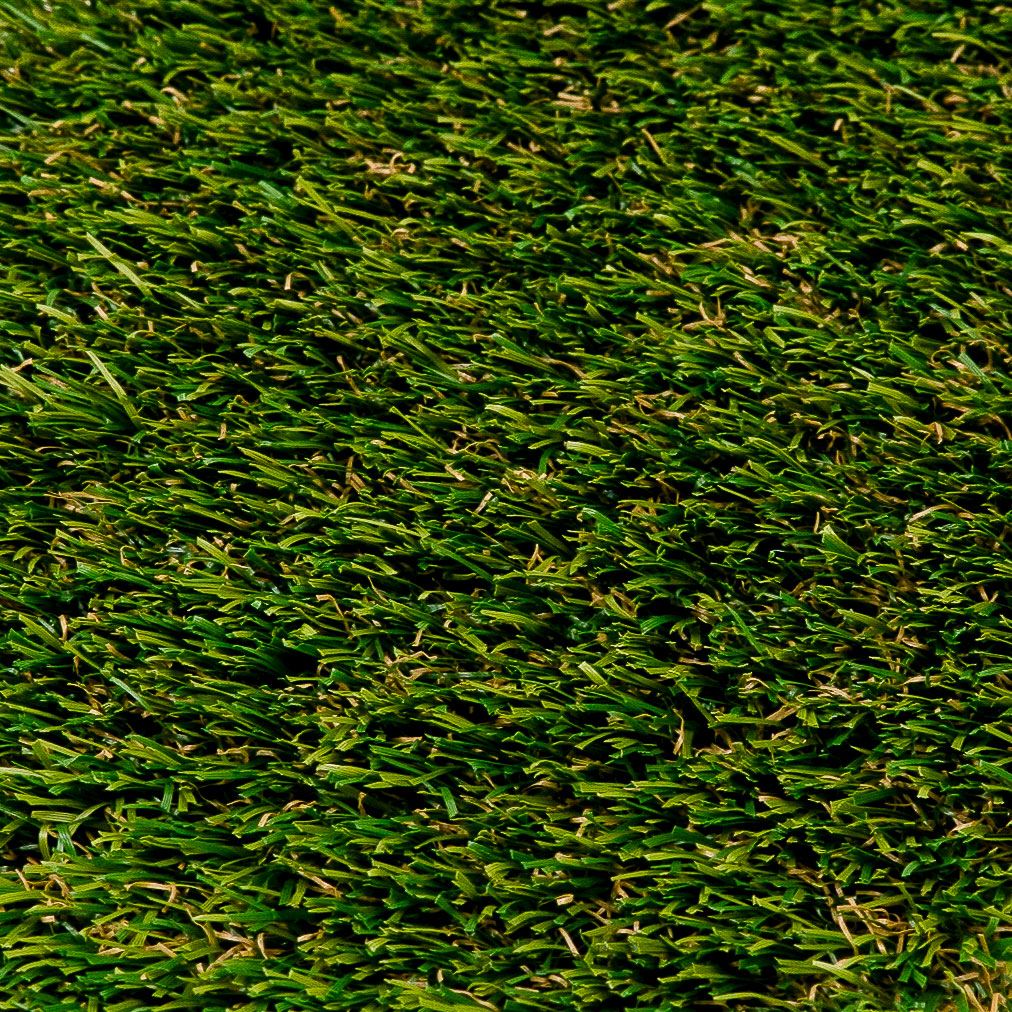 Close-up of dense green artificial grass blades forming an even, textured surface filling the entire frame