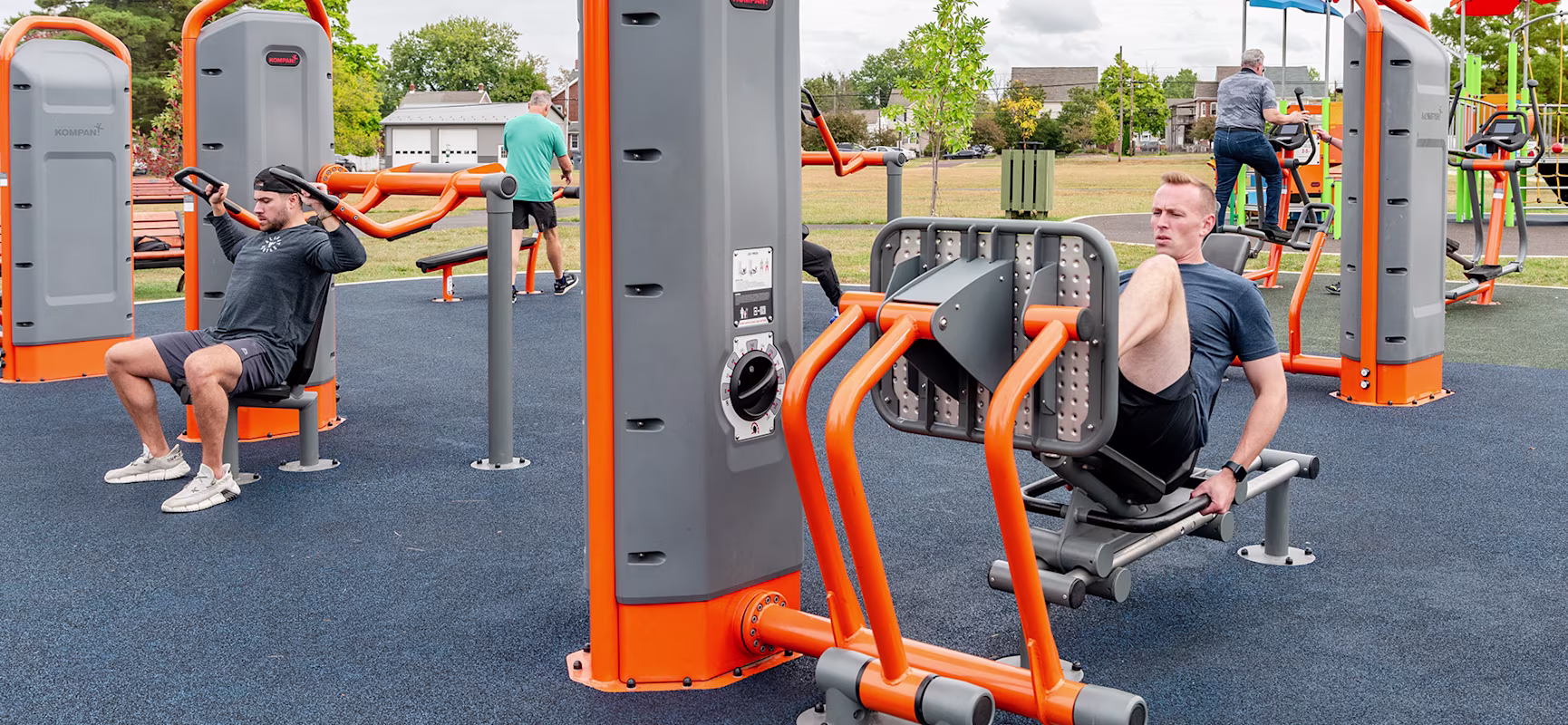 Men working out at outdoor fitness site