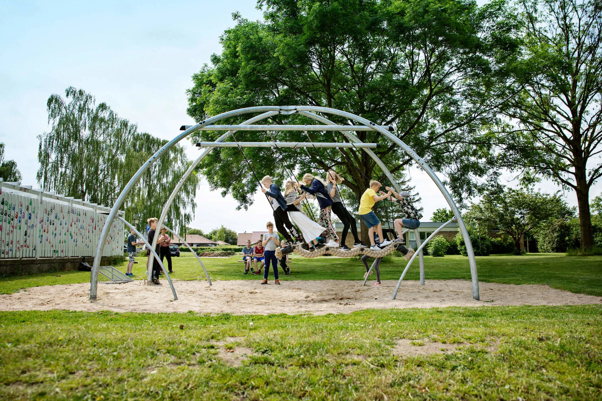 children playing on a wooden playground structure at Boyd Hill