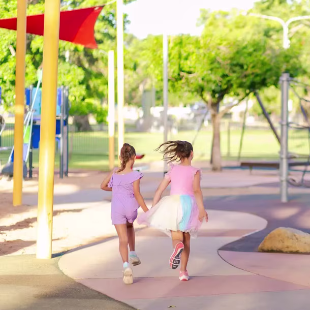 children playing on a wooden playground structure at Boyd Hill