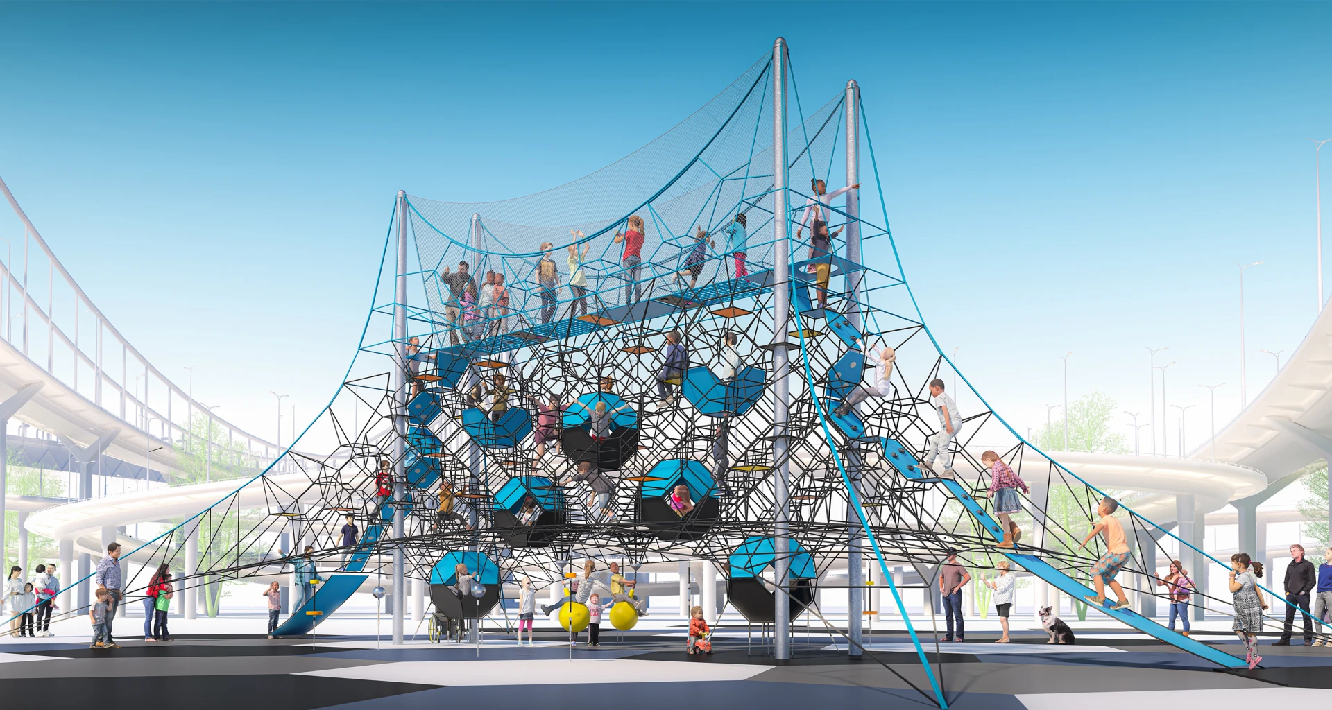 Children playing on a large rope playground structure