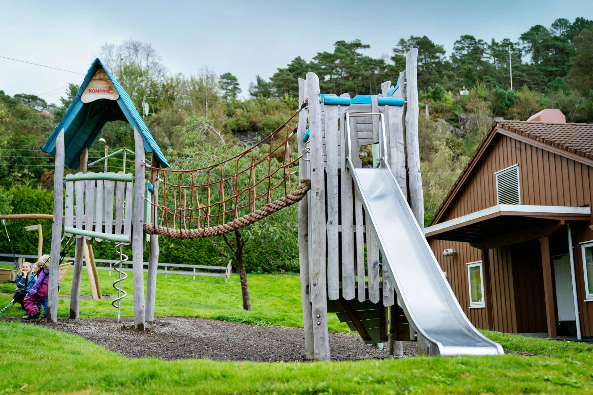 Wooden playtower at Espira daycare in Norway