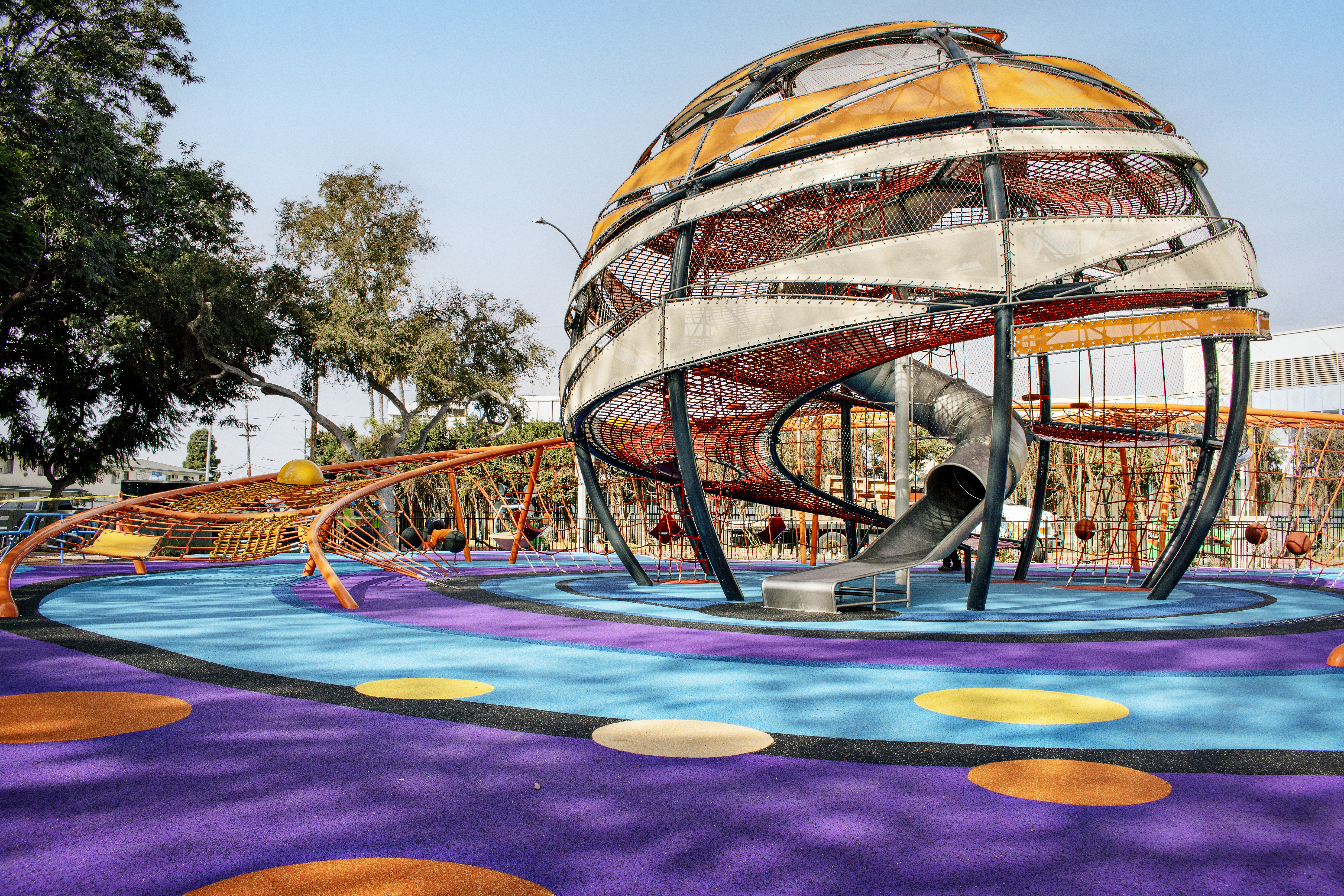 Large, custom rope climbing sphere with colorful surfacing in Lynwood, California