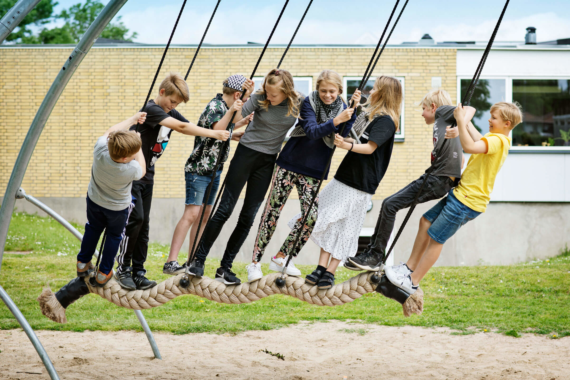 children playing on other robinia playground swings reference image
