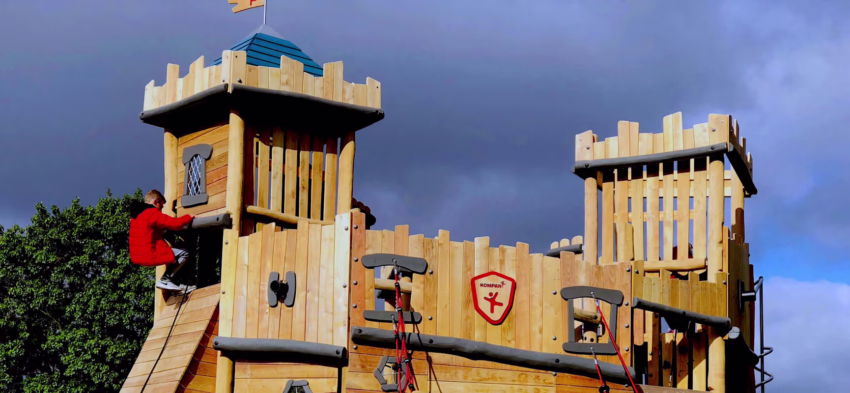 a wooden castle play structure in Covington City Park