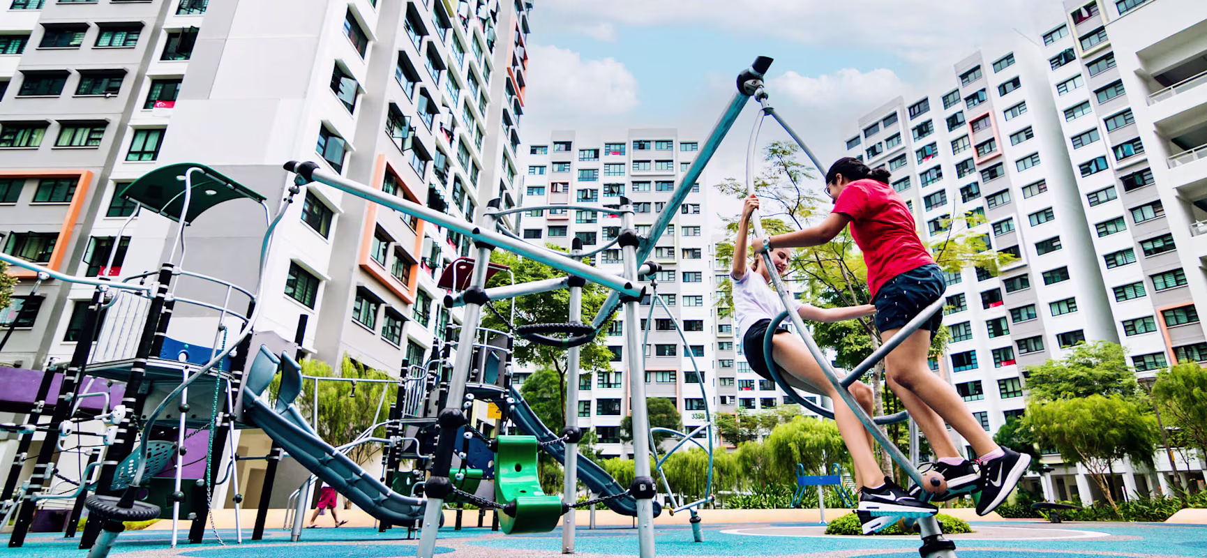 Girl playing on GALAXY play systems for teens at Yishun Riverwalk