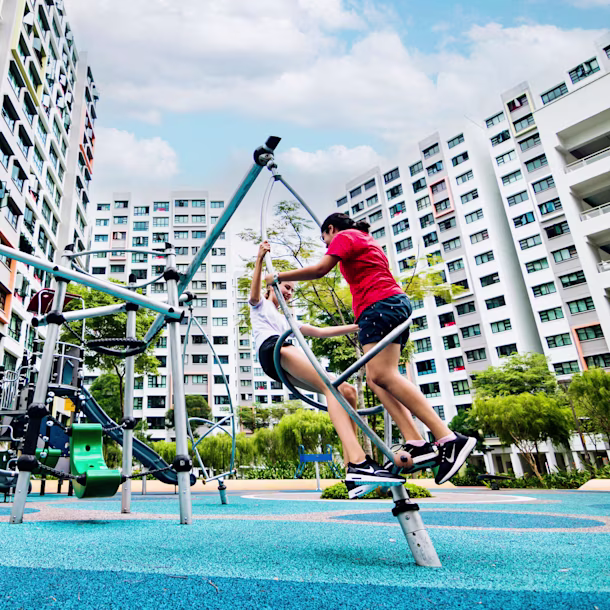Girl playing on GALAXY play systems for teens at Yishun Riverwalk