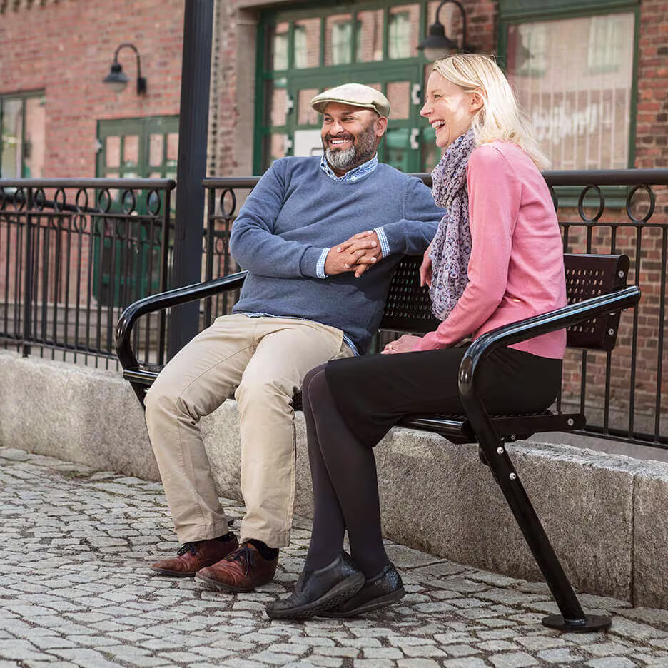 man-and-woman-sitting-in-outdoor-furniture-for-parks