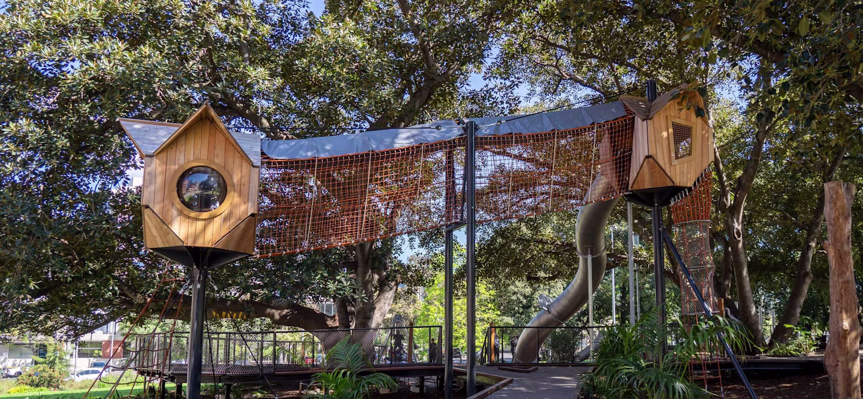 A tree house playground tower in the middle of a park in Melbourne