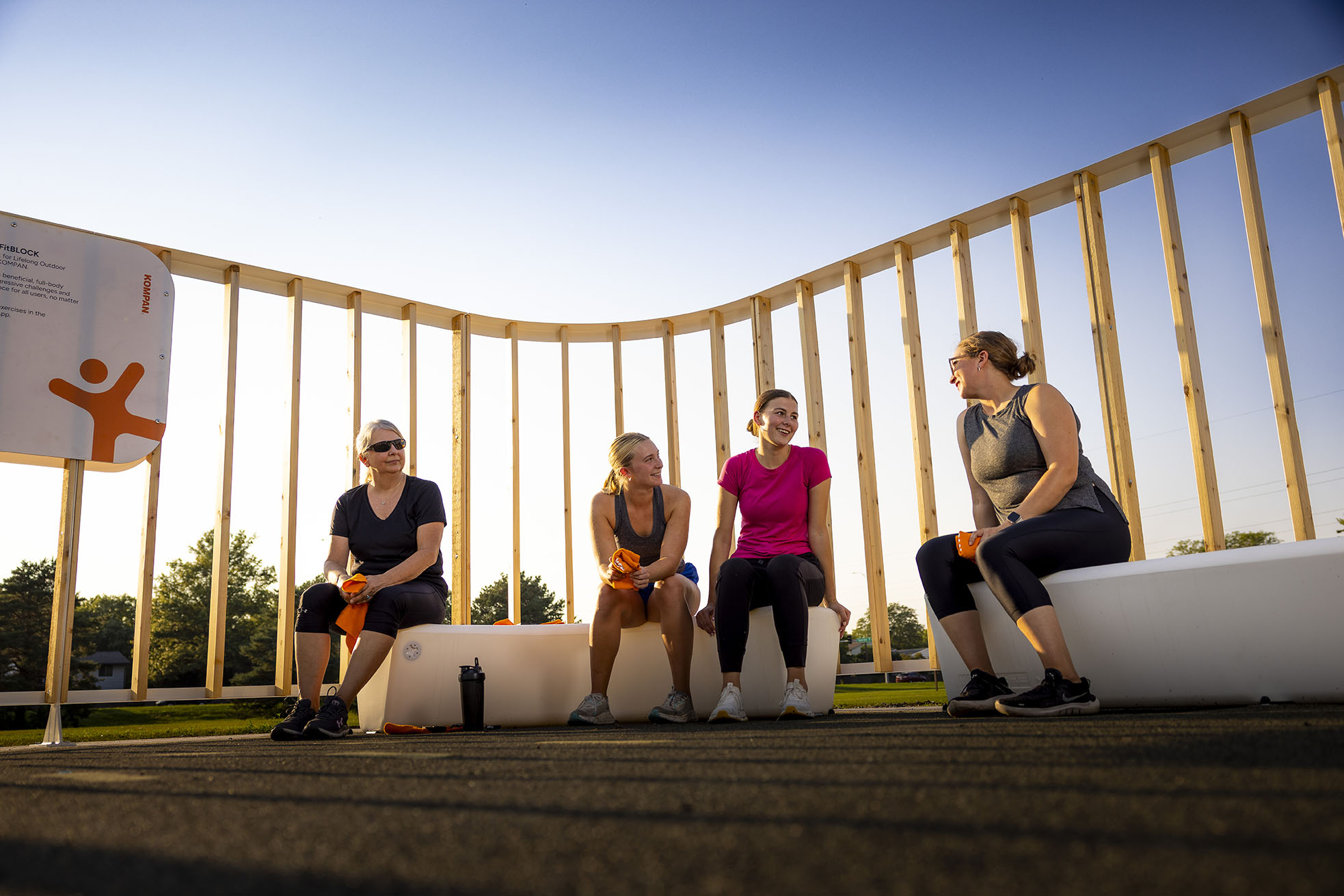 KOMPAN FitBLOCK social corner with group of women talking