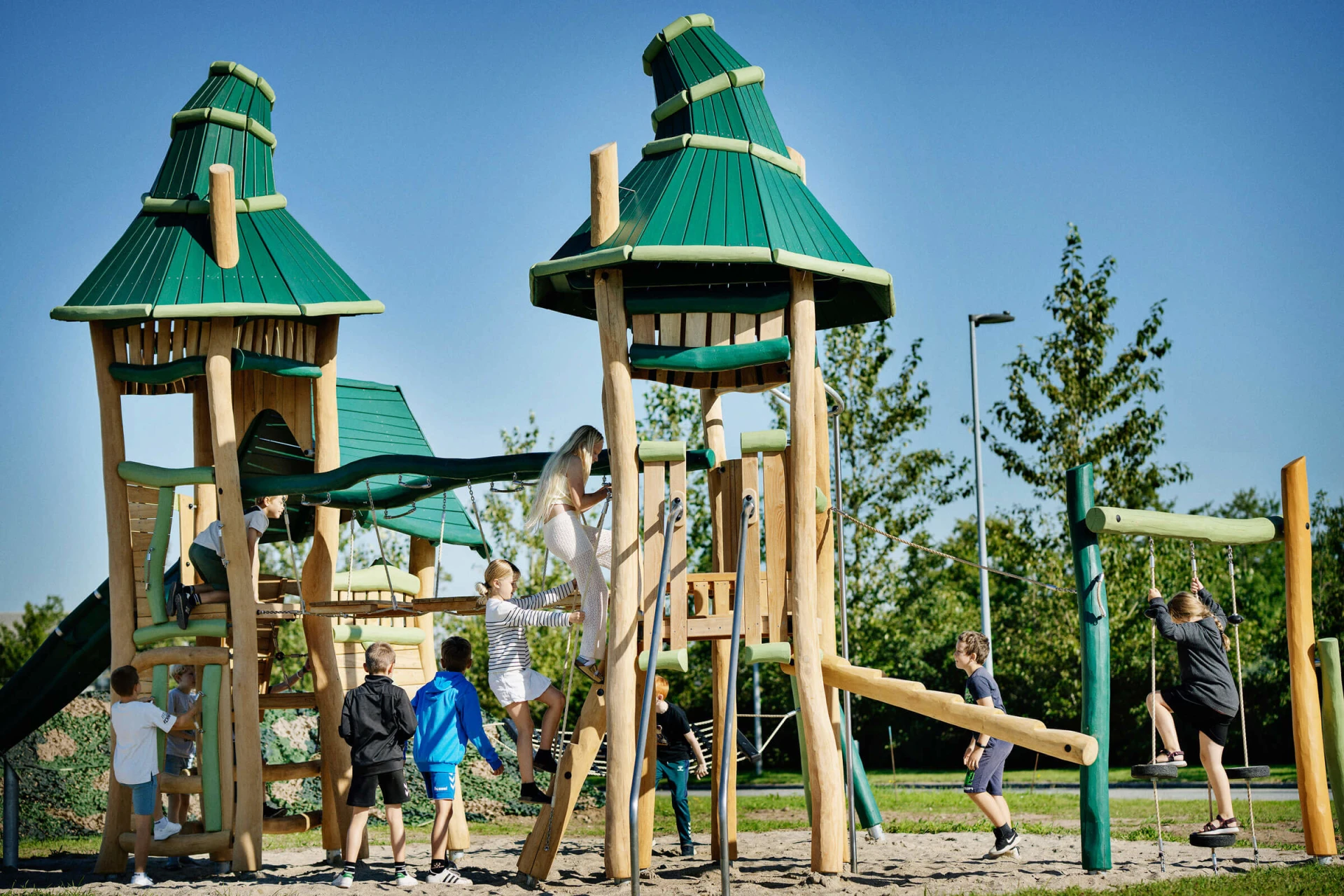 fatntasy themed wooden playground structures