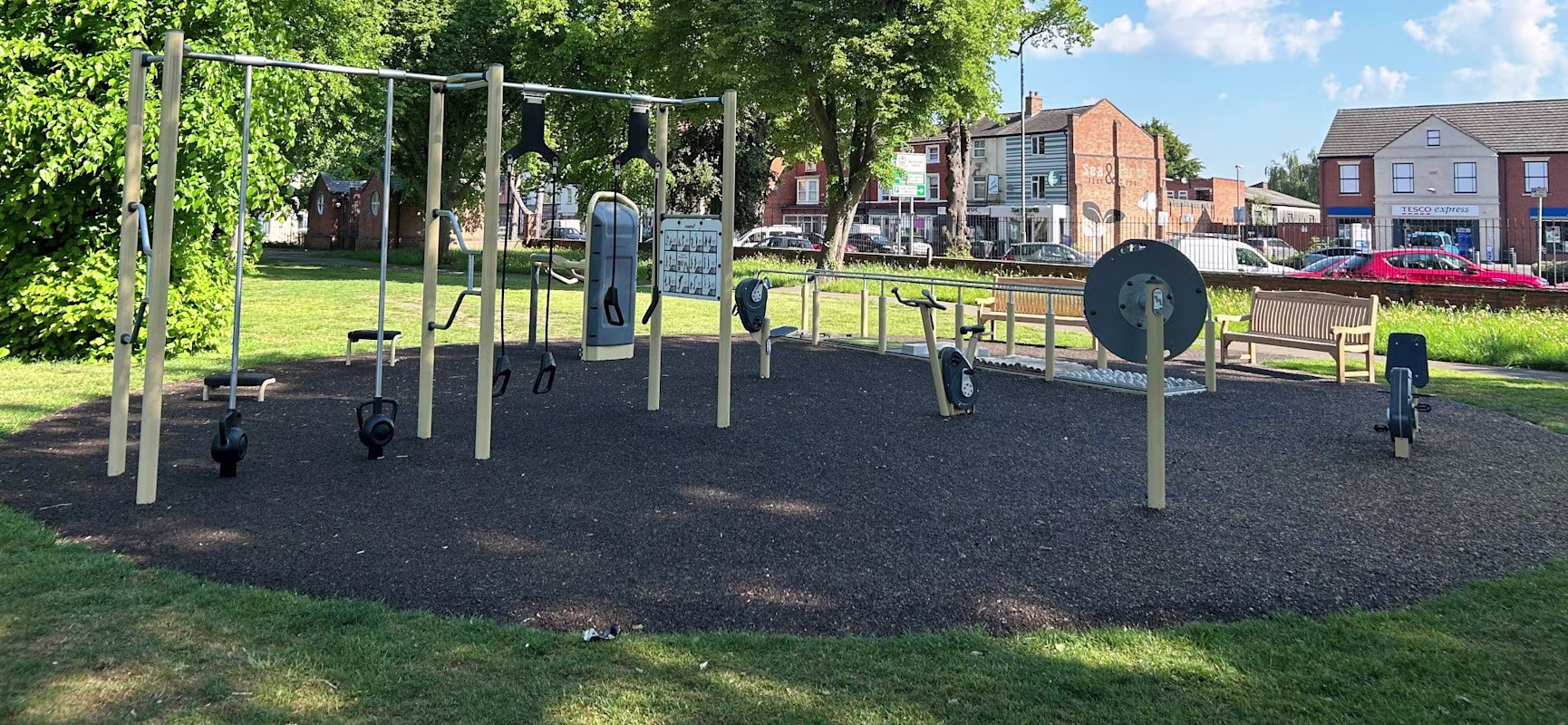 Natural beige cream outdoor gym in park tree setting