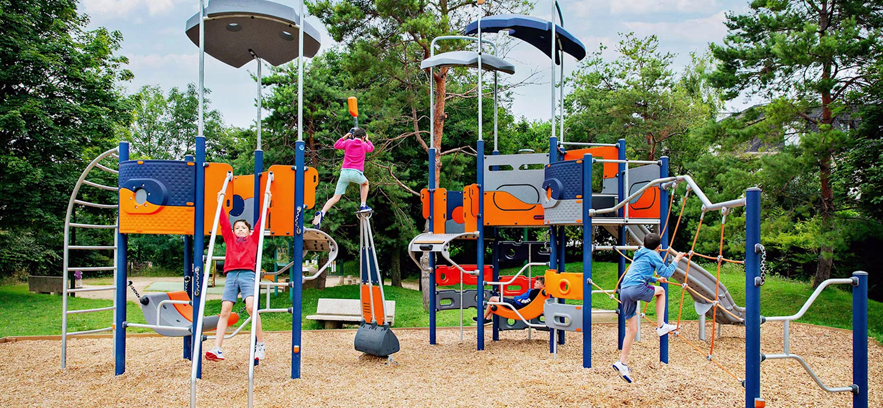 A group of kids playing on a playground.