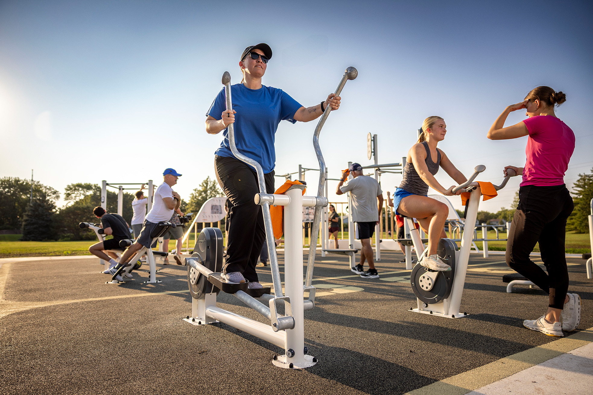 KOMPAN FitBLOCK outdoor fitness area with multiple users at Tierra Park in Lincoln, NE