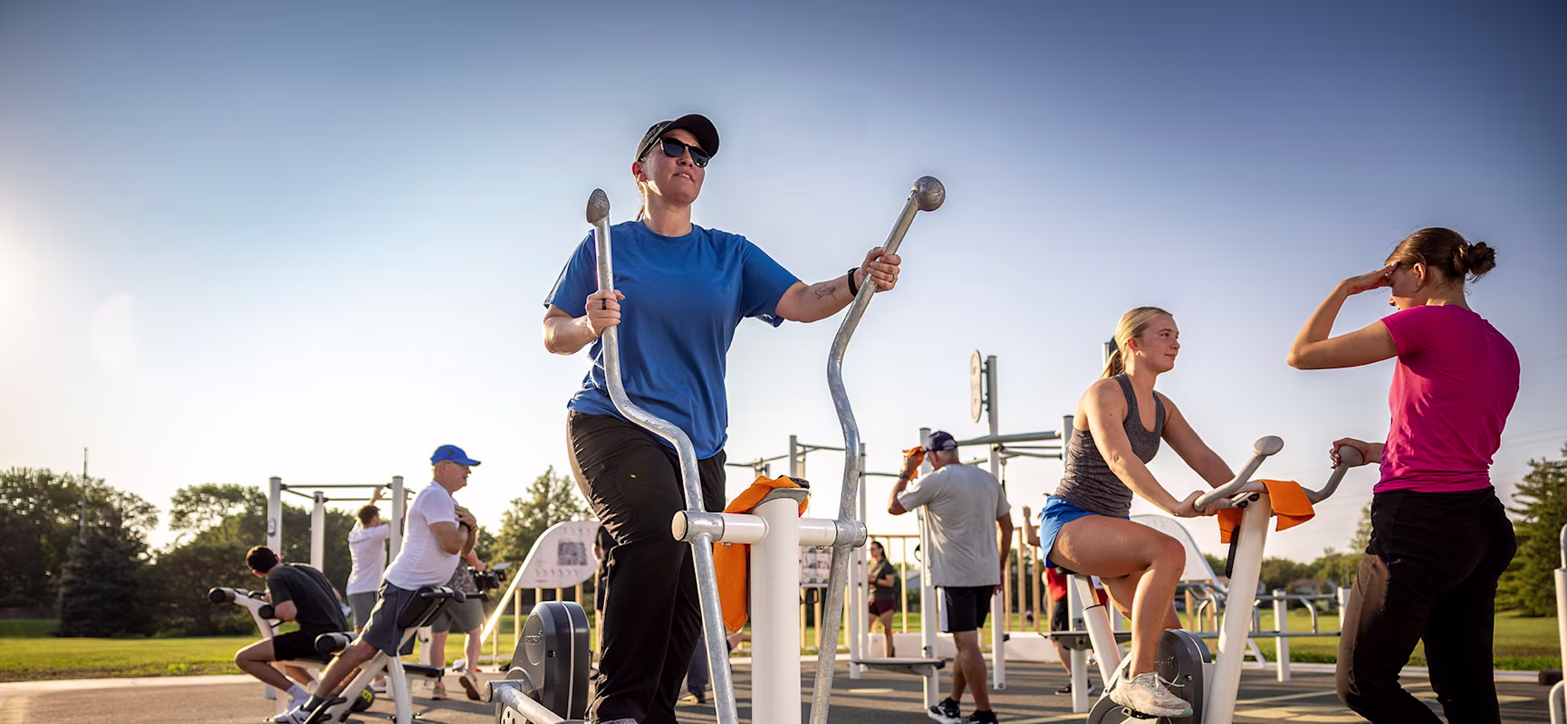 KOMPAN FitBLOCK outdoor fitness area with multiple users at Tierra Park in Lincoln, NE