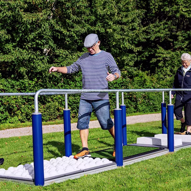 senior citizens using outdoor gym equipment for elderly hero image