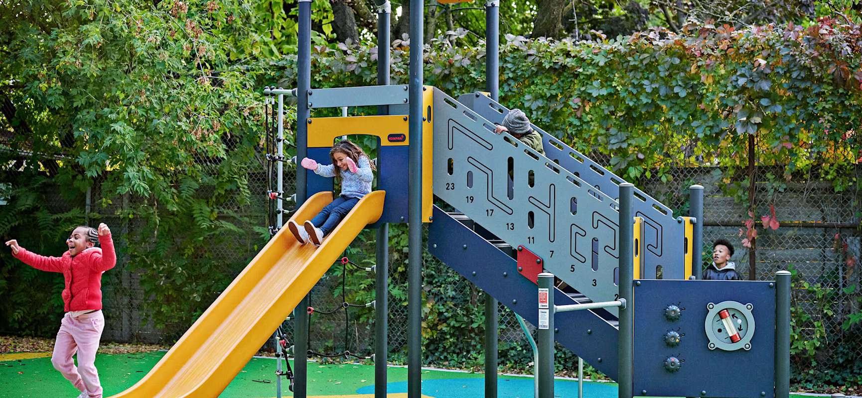 Children playing on play tower at Cawthra Park in Canada