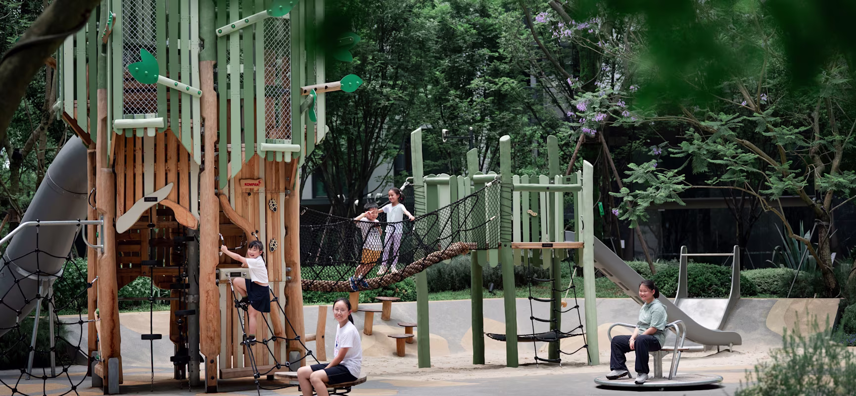 LUXELAKES Guanlan, Chengdu, China - children playing on playground