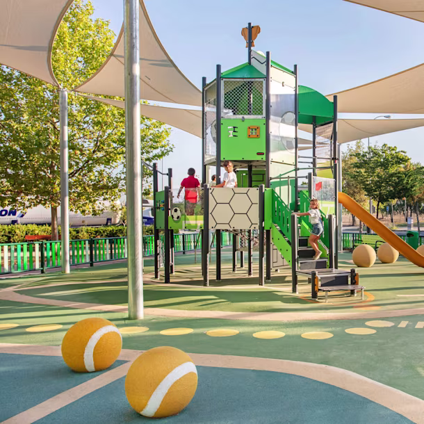 An image of a KOMPAN playground at a California park