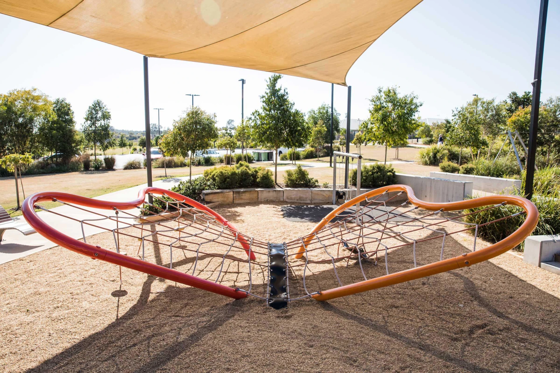 playground shade structure on a climbing playground structure