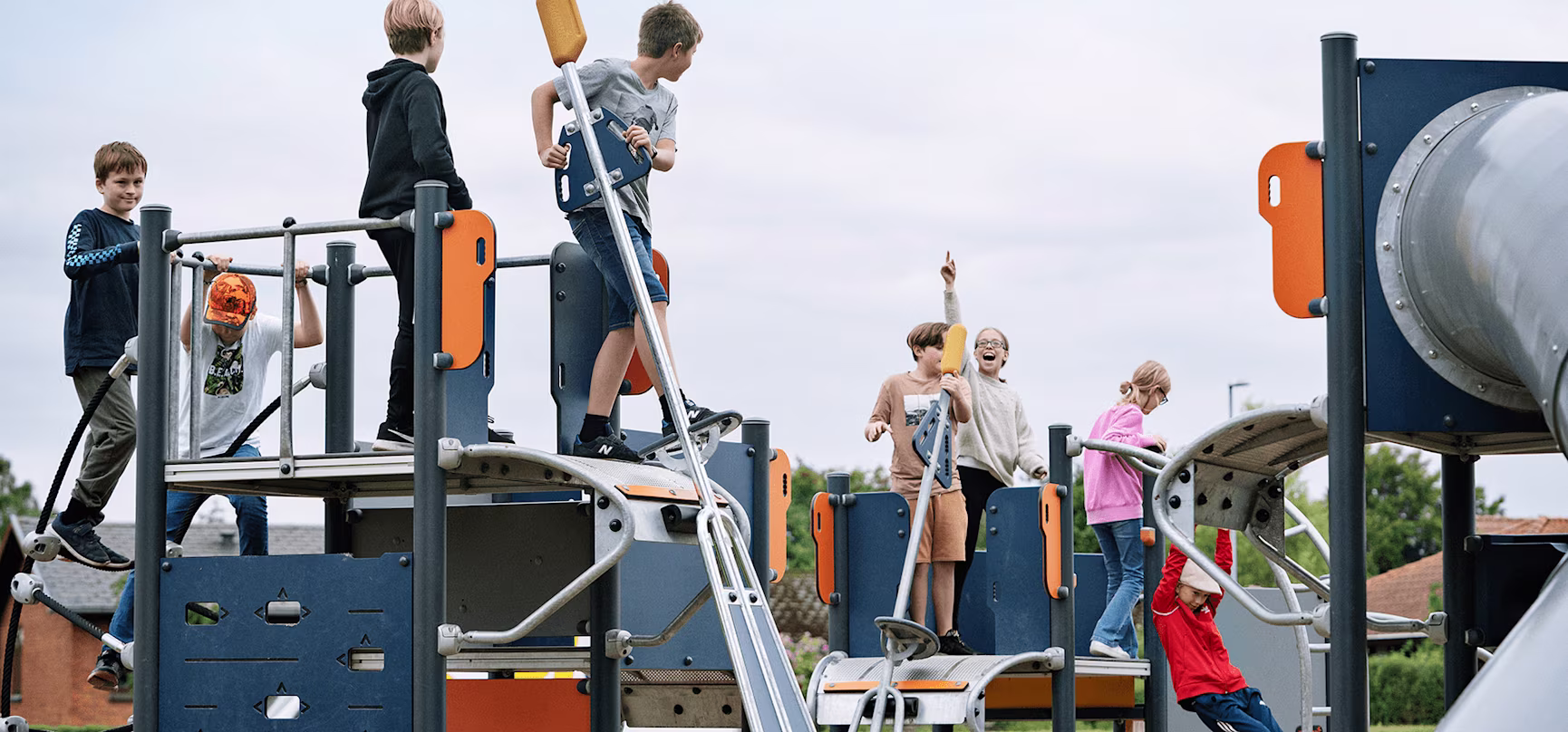hero image of children playing on playground system for school-agers