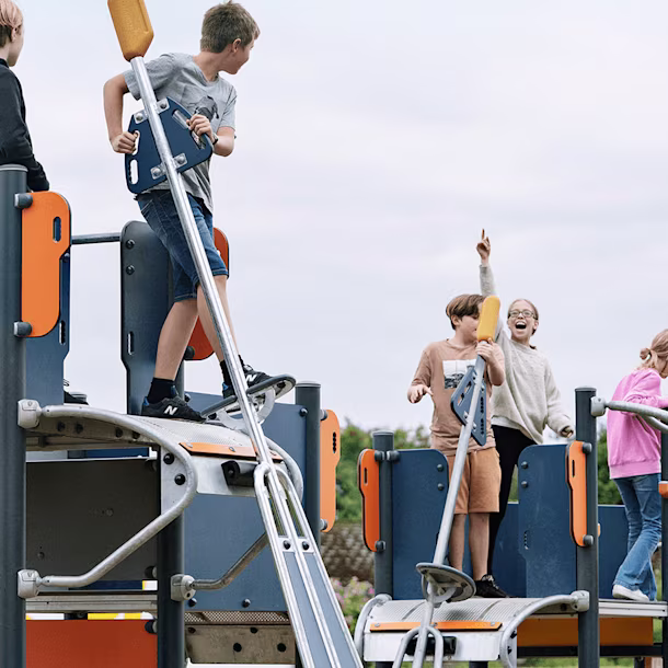 hero image of children playing on playground system for school-agers