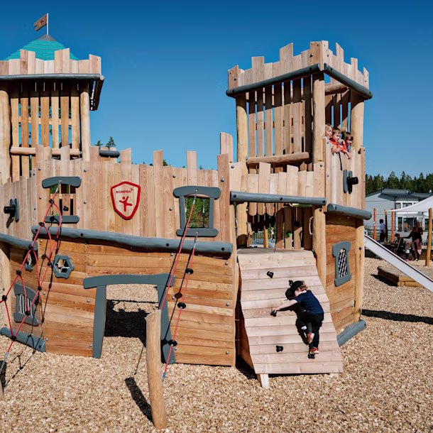 Wooden playground castle in Finland