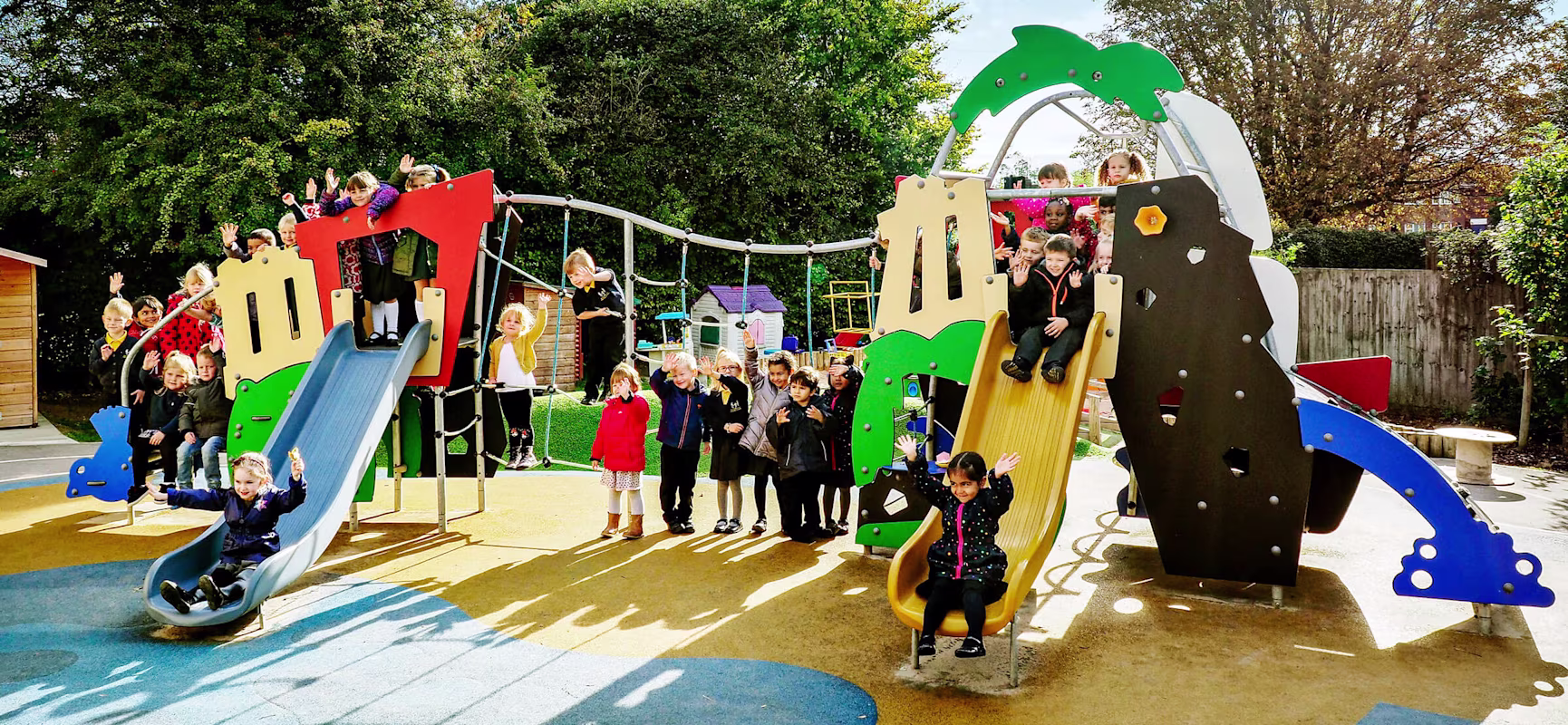 Children playing on kindergarten structure at Boothville Primary School