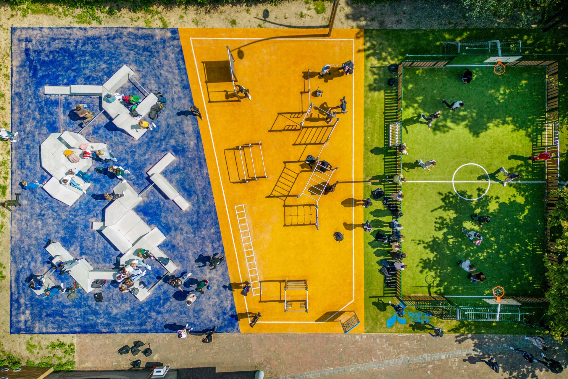 An aerial view of a school playground with fitness and ball game area