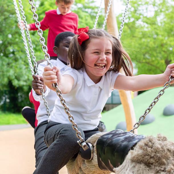 Girls playing in climbing trails for primary schools