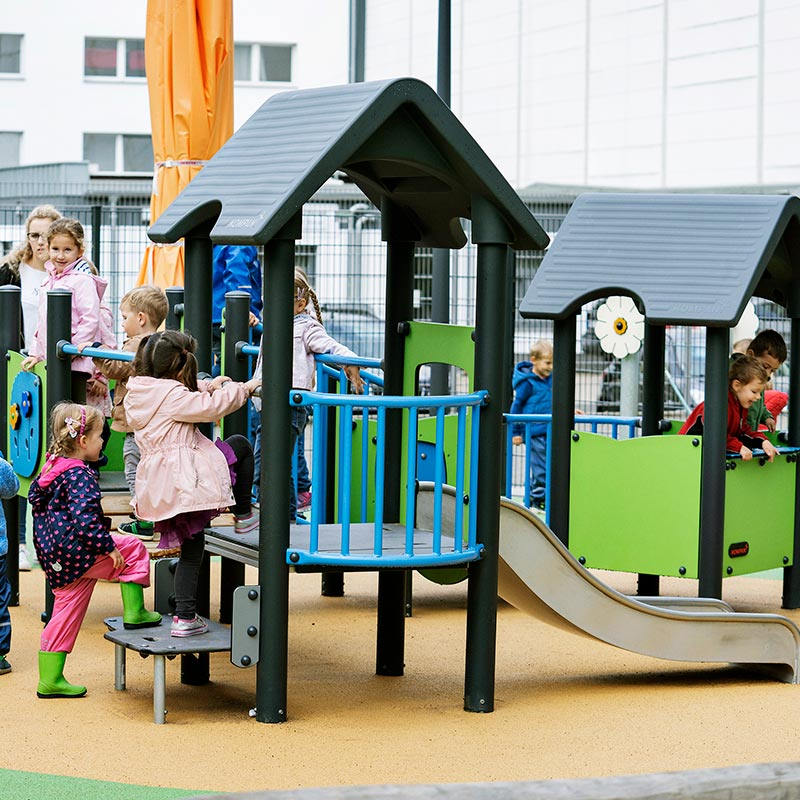 pre-school children in a kindergarten playing on MOMENT play system