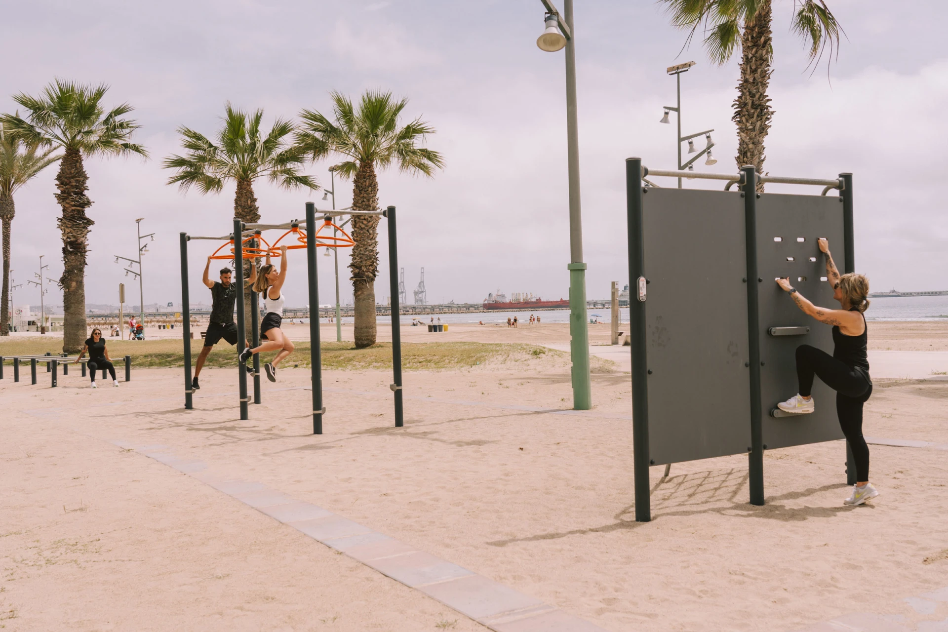 adults on an outdoor obstacle course