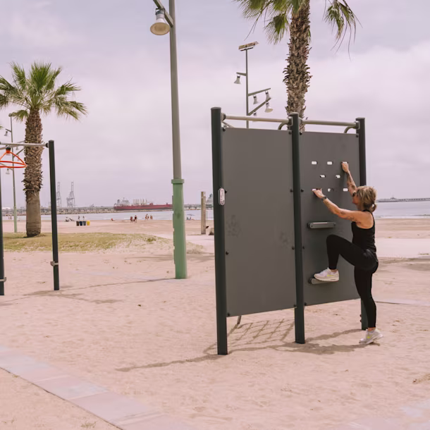adults on an outdoor obstacle course