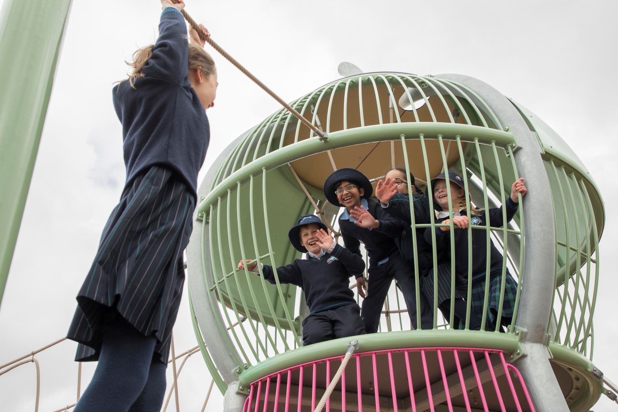Girls playing in climbing trails for primary schools