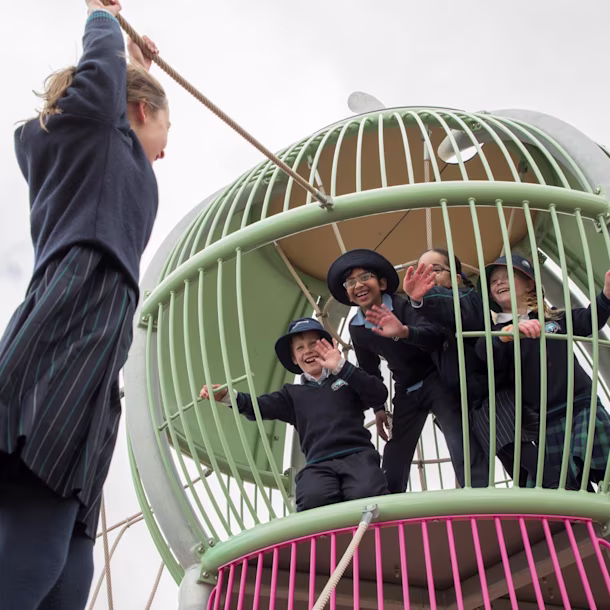 Girls playing in climbing trails for primary schools