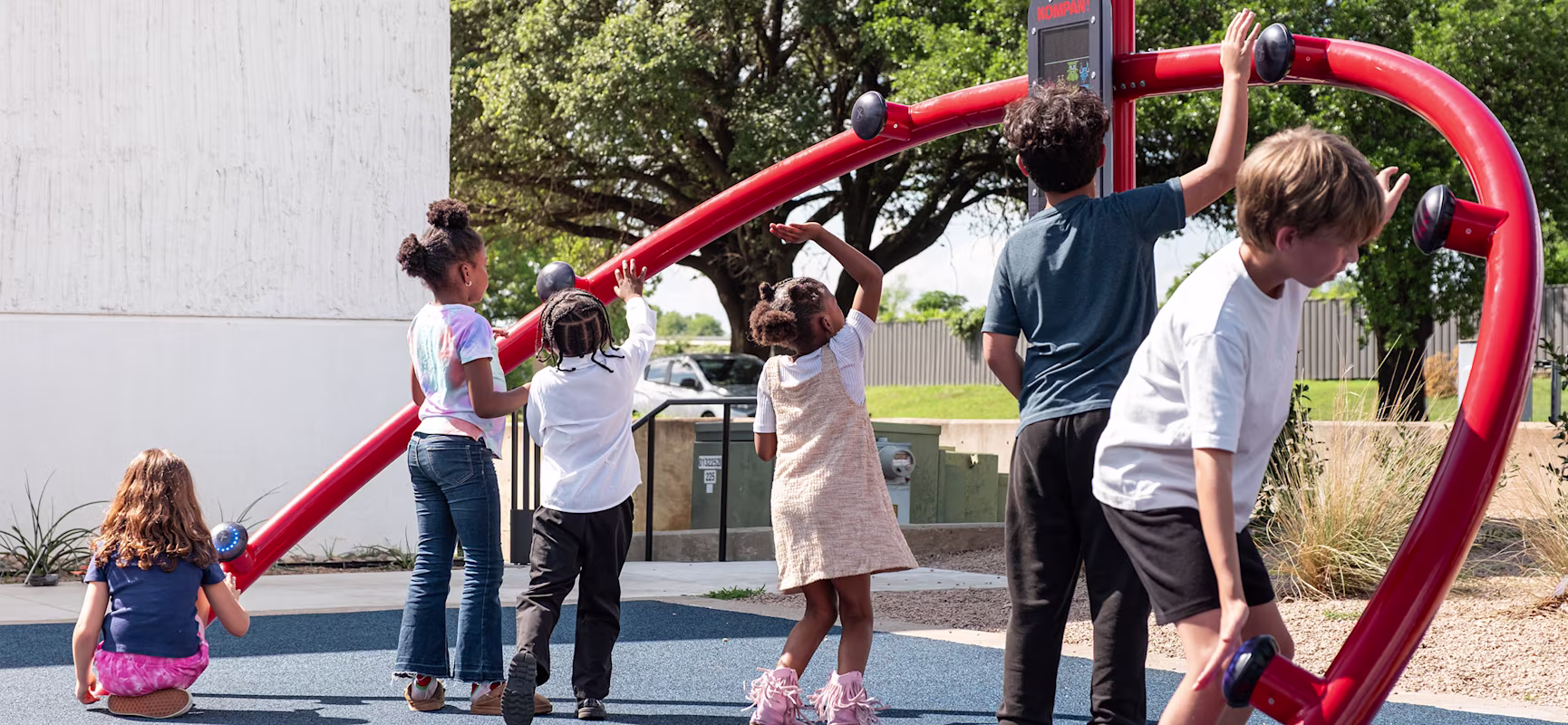 Children playing on OrbitPlay in Waco, Texas.