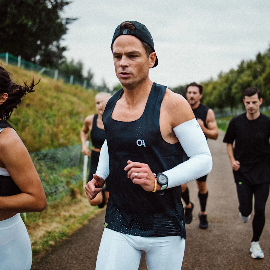 Man wearing compressive half tights and sleeves