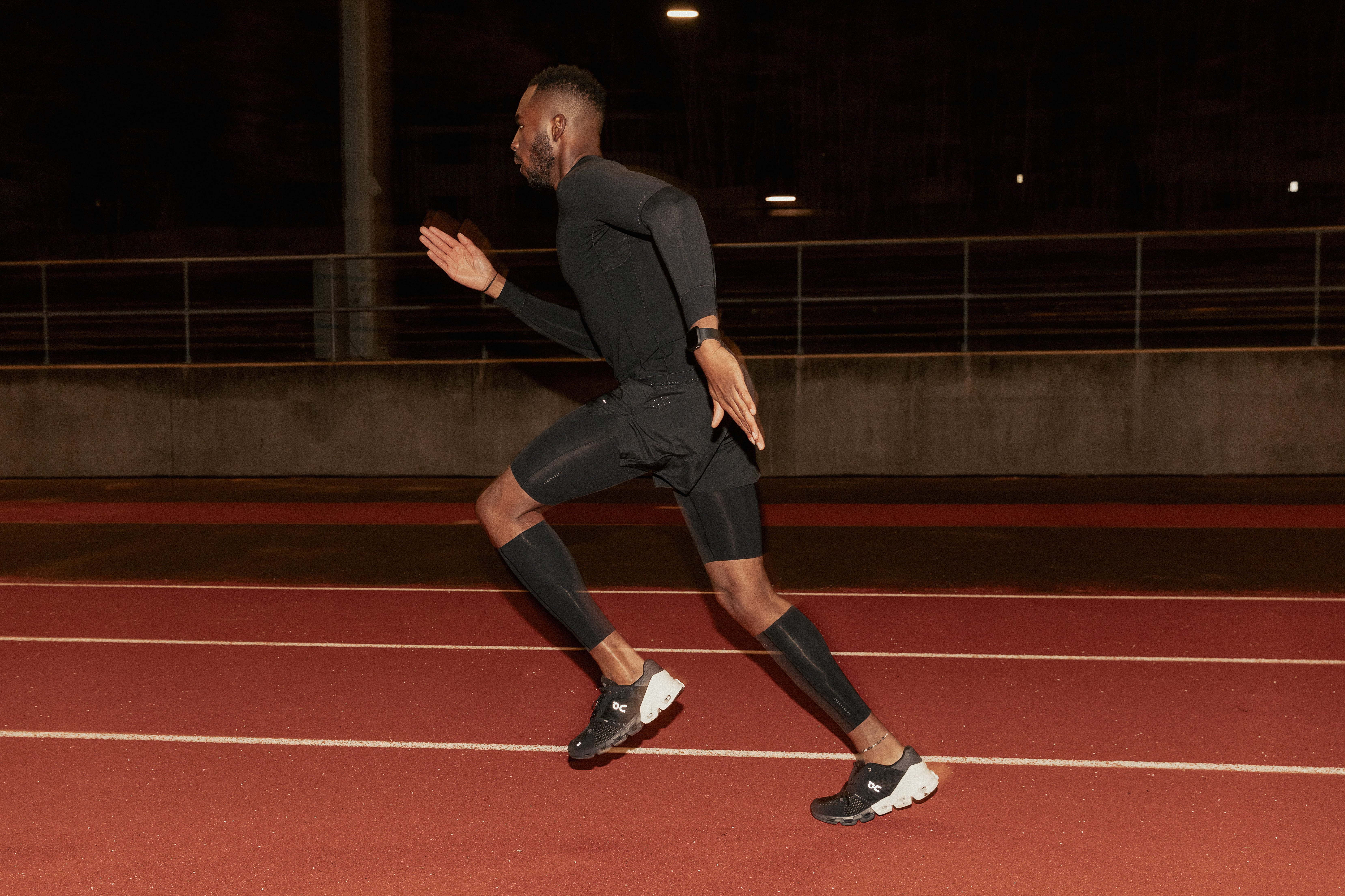 A Man Running In Compression Gear
