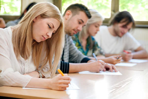 students-in-row-taking-test