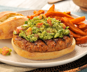 Hot Italian pork burgers with spinach guacamole 