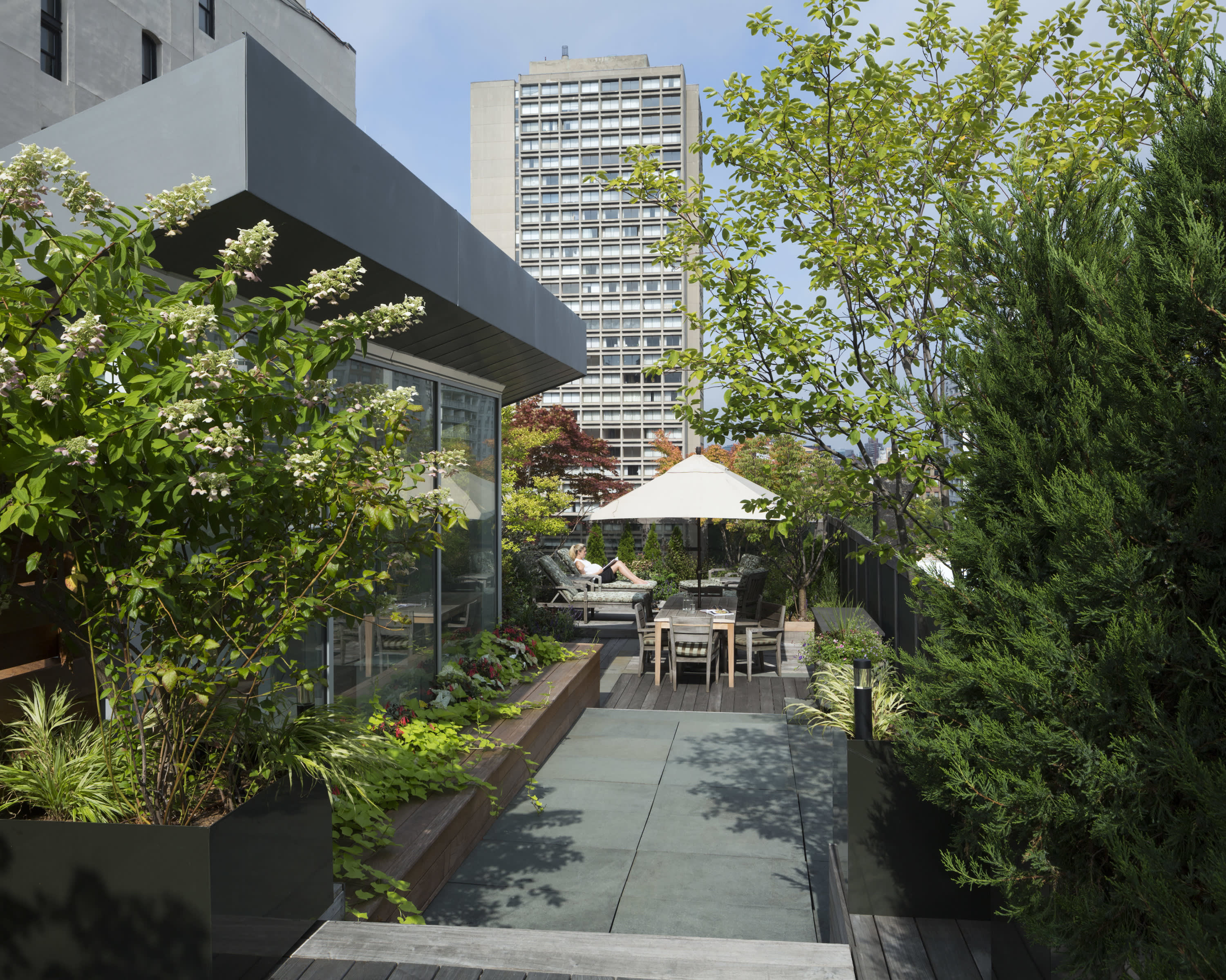 Ultra-modern NoHo loft renovation stars an oasis-like rooftop garden