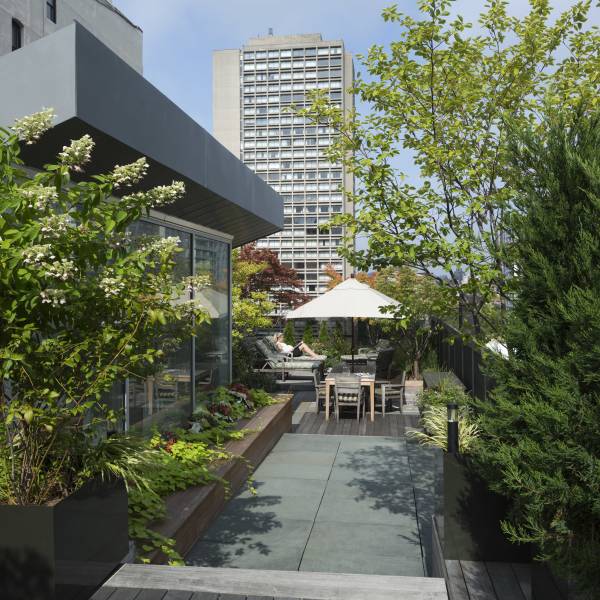 Ultra-modern NoHo loft renovation stars an oasis-like rooftop garden