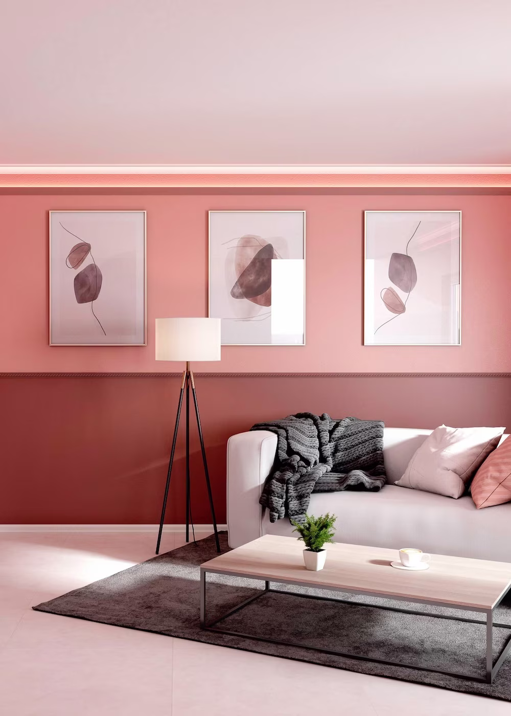 woonkamer met een geschilderde lambrisering op de muur in warm roze en rode kleur